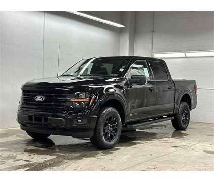 2024 Ford F-150 XLT is a Black 2024 Ford F-150 XLT Hybrid in Zelienople PA