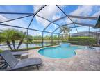 7420 Winding Cypress Dr, Naples, FL 34114