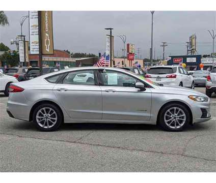 2019 Ford Fusion Hybrid SE is a Silver 2019 Ford Fusion Hybrid SE Hybrid in Van Nuys CA