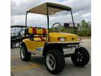 EZ-GO Lifted Yellow & Red 36 Volt Electric Golf Cart