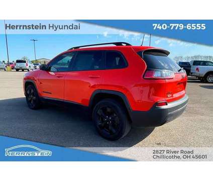 2021 Jeep Cherokee Altitude 4X4 is a Orange 2021 Jeep Cherokee Altitude SUV in Chillicothe OH