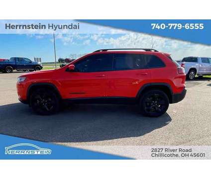 2021 Jeep Cherokee Altitude 4X4 is a Orange 2021 Jeep Cherokee Altitude SUV in Chillicothe OH