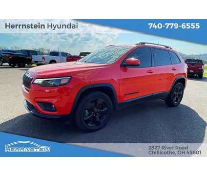 2021 Jeep Cherokee Altitude 4X4 is a Orange 2021 Jeep Cherokee Altitude SUV in Chillicothe OH