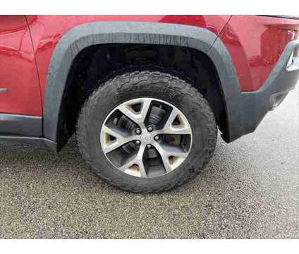 2014 Jeep Cherokee Trailhawk is a Red 2014 Jeep Cherokee Trailhawk SUV in Dubuque IA