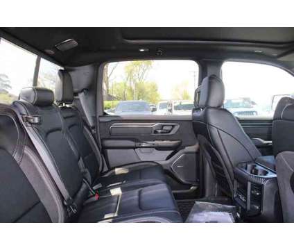 2024NewRamNew1500New4x4 Crew Cab 5 7 Box is a Blue 2024 RAM 1500 Model Car for Sale in Greenwood IN