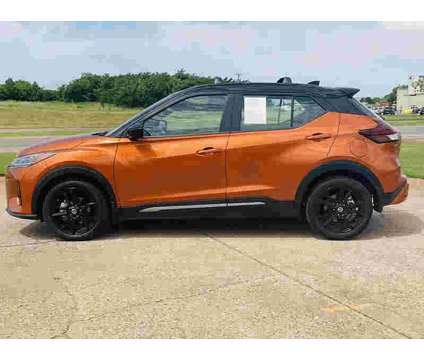 2021UsedNissanUsedKicksUsedFWD is a Black, Orange 2021 Nissan Kicks Car for Sale in Guthrie OK