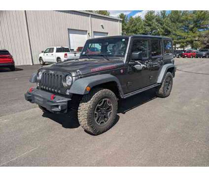 2017 Jeep Wrangler Unlimited Rubicon Hard Rock is a Grey 2017 Jeep Wrangler Unlimited Rubicon Car for Sale in Enfield CT