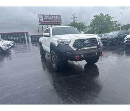 2019 Toyota Tacoma TRD Off-Road is a White 2019 Toyota Tacoma TRD Off Road Car for Sale in Lexington KY
