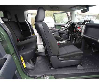 2014 Toyota FJ Cruiser 4WD 4dr Man (Natl) is a Green 2014 Toyota FJ Cruiser 4WD 4dr Man (Natl) SUV in Middletown RI