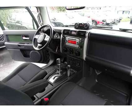 2014 Toyota FJ Cruiser 4WD 4dr Man (Natl) is a Green 2014 Toyota FJ Cruiser 4WD 4dr Man (Natl) SUV in Middletown RI