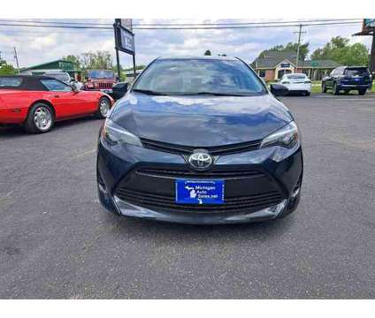 2018 Toyota Corolla for sale is a Blue 2018 Toyota Corolla Car for Sale in Kalamazoo MI
