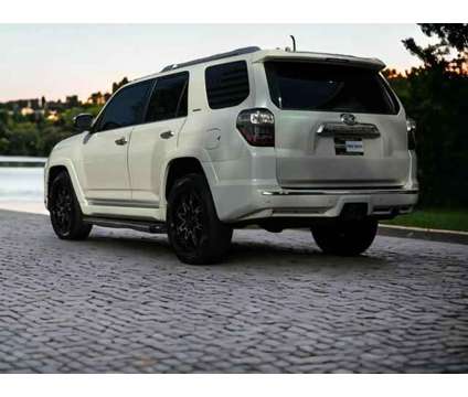 2014 Toyota 4Runner for sale is a White 2014 Toyota 4Runner 4dr Car for Sale in Duluth GA