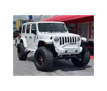 2018 Jeep Wrangler Unlimited for sale is a White 2018 Jeep Wrangler Unlimited Car for Sale in Hallandale Beach FL