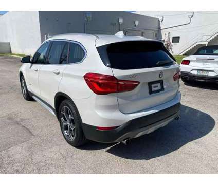 2016 BMW X1 for sale is a White 2016 BMW X1 Car for Sale in Hallandale Beach FL