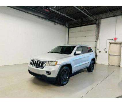 2012 Jeep Grand Cherokee for sale is a Silver 2012 Jeep grand cherokee Car for Sale in Addison IL