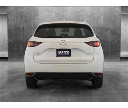 2021 Mazda CX-5 Touring is a White 2021 Mazda CX-5 Touring SUV in Des Plaines IL