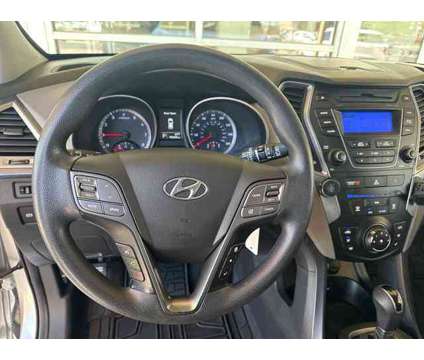 2015 Hyundai Santa Fe Sport 2.4L is a Silver 2015 Hyundai Santa Fe Sport 2.4L SUV in Wichita KS