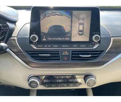 2020 Nissan Altima Platinum Intelligent AWD is a Red 2020 Nissan Altima 2.5 Trim Sedan in Dubuque IA