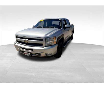 2010 Chevrolet Silverado 1500 LTZ is a Silver 2010 Chevrolet Silverado 1500 LTZ Truck in Quincy IL