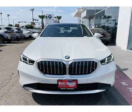 2024 BMW 5 Series i xDrive is a White 2024 BMW 5-Series Sedan in Mcallen TX