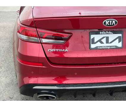 2019 Kia Optima S is a Red 2019 Kia Optima S Sedan in Billings MT