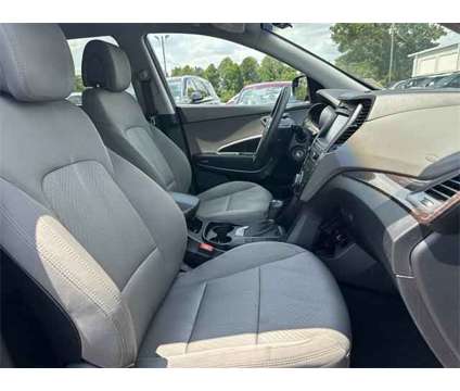 2017 Hyundai Santa Fe Sport 2.4L is a Black 2017 Hyundai Santa Fe Sport 2.4L SUV in Auburn AL