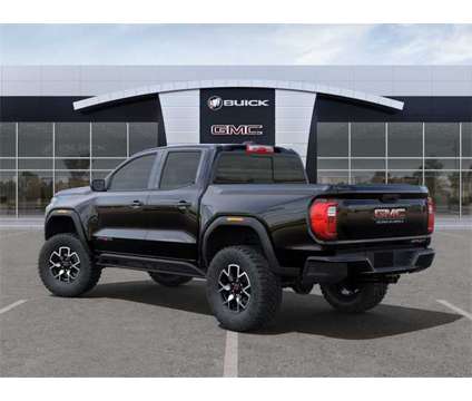 2024 GMC Canyon AT4X is a Black 2024 GMC Canyon Truck in Westland MI