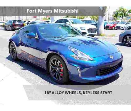 2016 Nissan 370Z Base is a Blue 2016 Nissan 370Z Base Coupe in Fort Myers FL