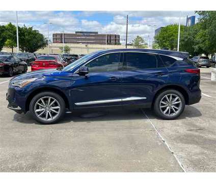 2024 Acura RDX Technology Package SH-AWD is a Blue 2024 Acura RDX Technology Package SUV in Houston TX