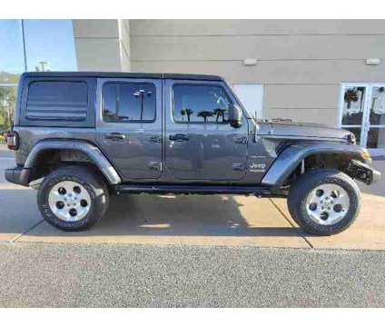 2018 Jeep Wrangler Unlimited Sahara is a Grey 2018 Jeep Wrangler Unlimited Car for Sale in Henderson NV