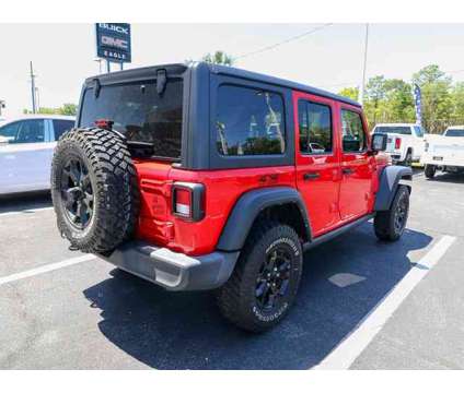 2021 Jeep Wrangler Unlimited Willys is a Red 2021 Jeep Wrangler Unlimited Car for Sale in Homosassa FL