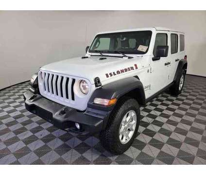 2021 Jeep Wrangler Unlimited Islander is a White 2021 Jeep Wrangler Unlimited Car for Sale in Orlando FL