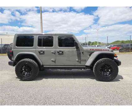 2022 Jeep Wrangler Unlimited Rubicon is a Grey 2022 Jeep Wrangler Unlimited Car for Sale in Orlando FL