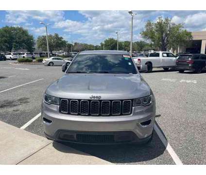 2021 Jeep Grand Cherokee Laredo X is a Silver 2021 Jeep grand cherokee Laredo Car for Sale in Orlando FL