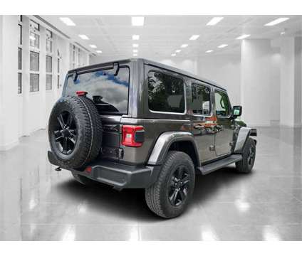2021 Jeep Wrangler Unlimited Sahara Altitude is a Grey 2021 Jeep Wrangler Unlimited Car for Sale in Orlando FL
