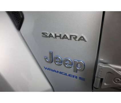 2023 Jeep Wrangler Sahara 4xe is a Silver 2023 Jeep Wrangler Sahara Car for Sale in Henderson NV