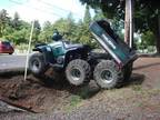 2001 Polaris Sportsman 500cc 6x6 376 miles 146 hours, dump bed.