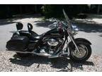 $11,000 2004 Harley Road King Custom FLHRSI complete with Trailer