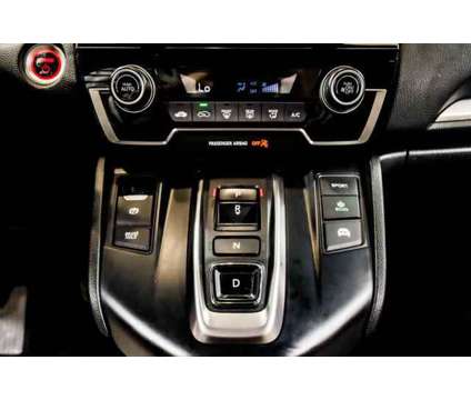 2020 Honda CR-V Hybrid LX is a Silver, White 2020 Honda CR-V Hybrid in Peoria AZ