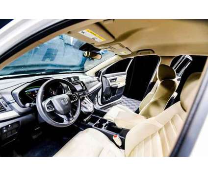 2020 Honda CR-V Hybrid LX is a Silver, White 2020 Honda CR-V Hybrid in Peoria AZ