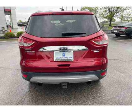 2015 Ford Escape Titanium is a Red 2015 Ford Escape Titanium Car for Sale in Olathe KS
