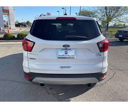 2019 Ford Escape SEL is a White 2019 Ford Escape SEL Car for Sale in Olathe KS
