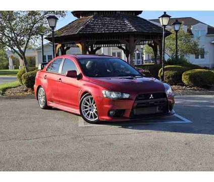 2014 Mitsubishi Lancer for sale is a Red 2014 Mitsubishi Lancer Car for Sale in Louisville KY