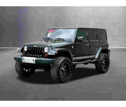 2011 Jeep Wrangler Unlimited Sahara is a Black 2011 Jeep Wrangler Unlimited Sahara SUV in Knoxville TN