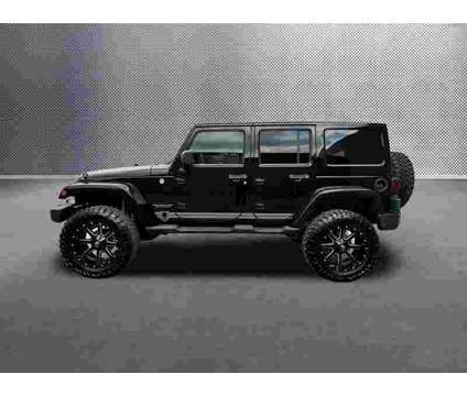 2011 Jeep Wrangler Unlimited Sahara is a Black 2011 Jeep Wrangler Unlimited Sahara SUV in Knoxville TN