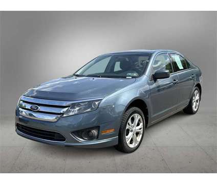 2012 Ford Fusion SE is a Blue 2012 Ford Fusion SE Sedan in Pittsburgh PA