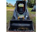 like new John Deere 317G skid steer