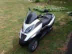 2009 piaggio motorcycle 250 cc fully automatic, 3 wheels