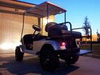 $3,750 Custom EZ-GO Lifted Golf Cart. A Show Stopper! Big Tires and Fast!