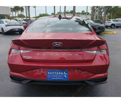 2023 Hyundai Elantra SEL is a Red 2023 Hyundai Elantra Sedan in Daytona Beach FL
